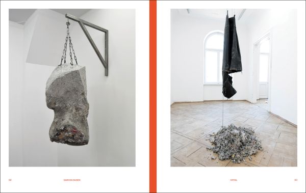 Book cover of Slash & Burn: Marcin Dudek, with a crowd of people running on a sports pitch, with paper strewn on the ground. Published by Hopper&Fuchs.