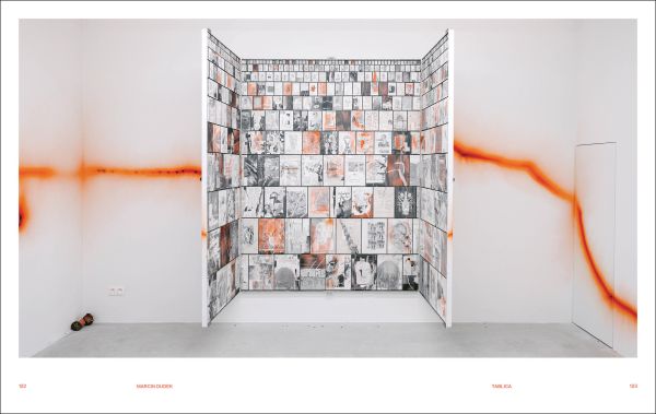 Book cover of Slash & Burn: Marcin Dudek, with a crowd of people running on a sports pitch, with paper strewn on the ground. Published by Hopper&Fuchs.