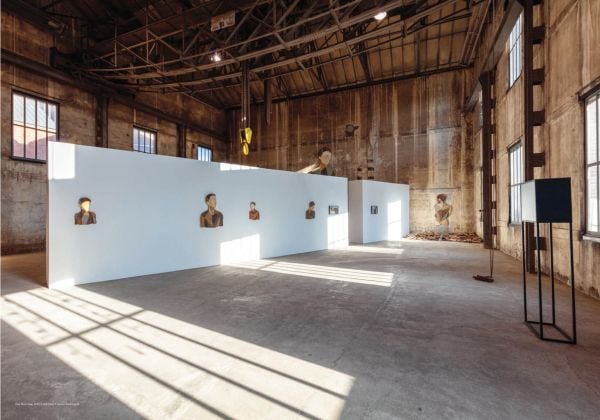 Flat wood collage of half length figure on white cover of 'Strook, Portraits', by Hannibal Books.