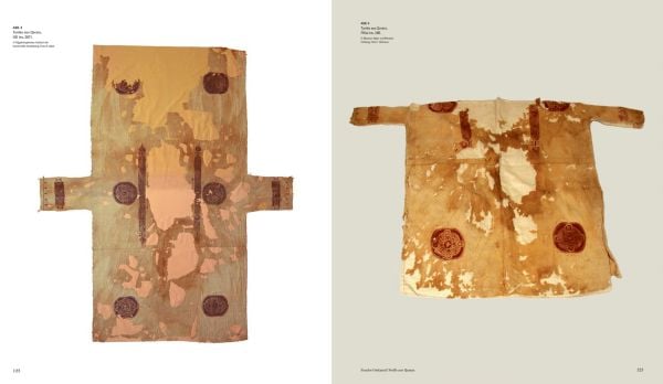 Two pieces of aging Egyptian embroidered cloth, on white cover of 'Explorers, First Collectors and Traders of Textiles', by Hannibal Books.