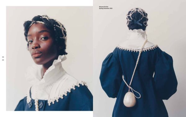 Book cover of Mirror Mirror, Fashion & the Psyche, with a portrait of female on magazine page with folds skewing face. Published by Hannibal Books.