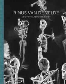 White skeletal figures on black cover, 'RINUS VAN DE VELDE, A FICTIONAL AUTOBIOGRAPHY', in silver font above. by Hannibal Books.