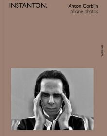 Book cover of Instanton, Phone Photos, featuring Australian singer songwriter Nick Cave, with eyes closed and fingers on temples. Published by Hannibal Books.