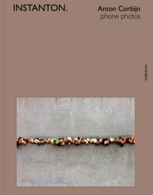 Book cover of Instanton, Phone Photos, featuring Australian singer songwriter Nick Cave, with eyes closed and fingers on temples. Published by Hannibal Books.