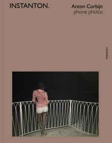 Book cover of Instanton, Phone Photos, featuring Australian singer songwriter Nick Cave, with eyes closed and fingers on temples. Published by Hannibal Books.