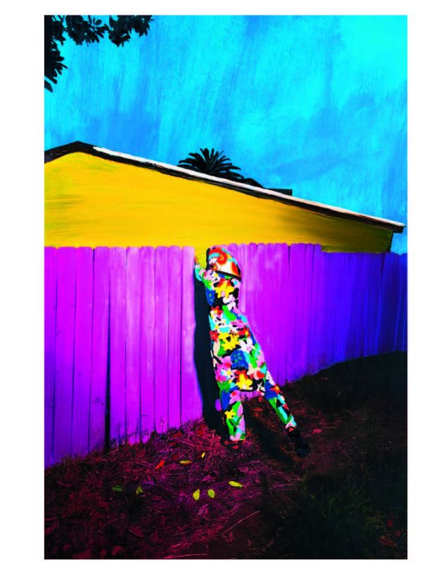 Book cover of The Endless Coloured Ways, featuring a nude female holding baby, sitting on a stool covered with brightly-coloured floral rug. Published by Hannibal Books.