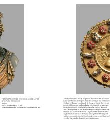 Art museum with statues in front, on cover of 'Kunsthistorisches Museum Vienna, The Official Museum Book', by Hannibal Books.