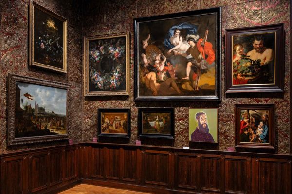 Book cover of Carl Depauw's Conversations: Contemporary and Historical Masters in Dialogue, with painting of armoured figure holding pan of gold and silver. Published by Hannibal Books.