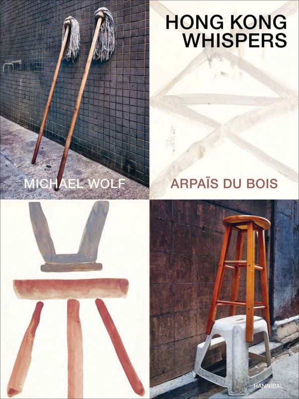 Book cover of Hong Kong Whispers, with two mops resting against wall, and two stools stacked on top of each other. Published by Hannibal Books.