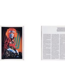 Book cover of Cindy Sherman: Anti-Fashion, with the artist dressed as a clown, wearing a pink curly wig. Published by Hannibal Books.