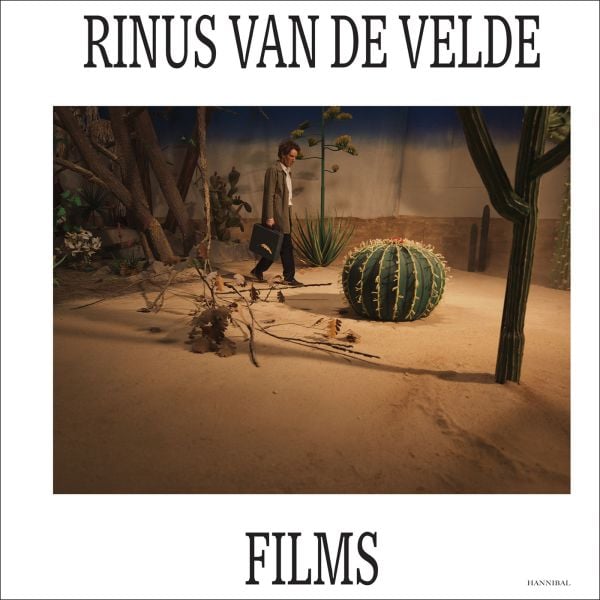 Book cover of Rinus van de Velde: Films, with a film set of desert sand with a large cactus. Published by Hannibal Books.