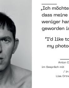 Book cover of Favourite Darkness: Anton Corbijn, featuring a man standing behind a street sign. Published by Hannibal Books.
