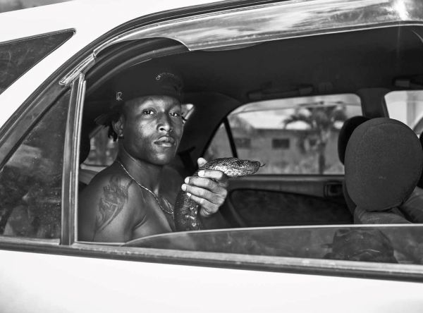 Book cover of Stacii Samidin, featuring the photographer in seated pose. Published by Hannibal Books.