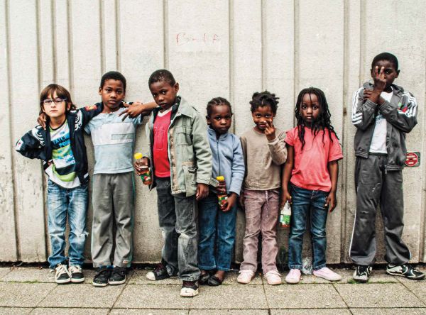 Book cover of Stacii Samidin, featuring the photographer in seated pose. Published by Hannibal Books.