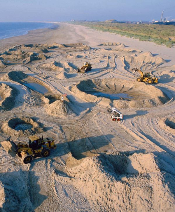 Grey cratered surface on cover of 'Moon, Photographing the Moon 1840-Now', by Hannibal Books.