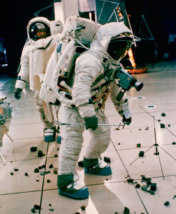 Grey cratered surface on cover of 'Moon, Photographing the Moon 1840-Now', by Hannibal Books.