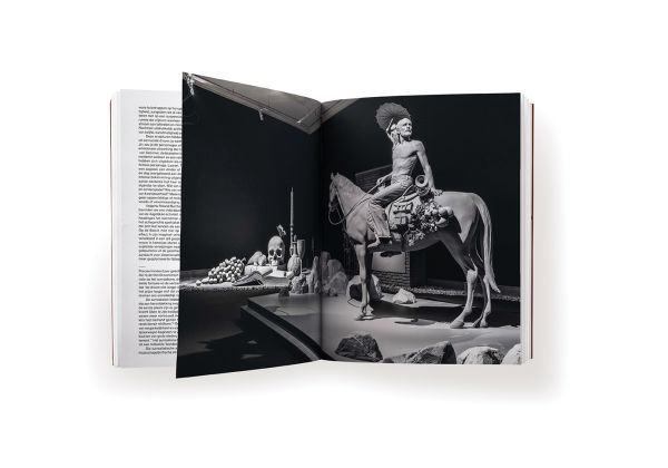 Book cover of Nocturnal Journey: Hans Op de Beeck: featuring a monochrome grey sculpture of a young girl wearing a tutu dress. Published by Hannibal Books.