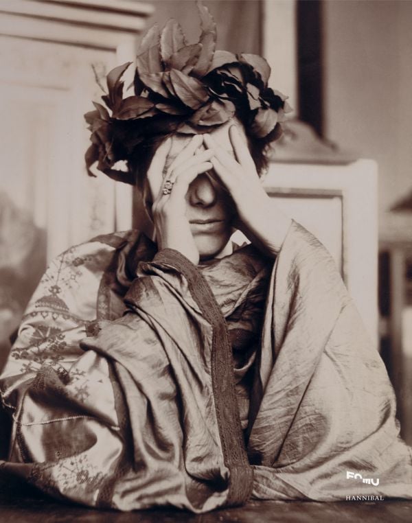 Book cover of Early Gaze: Unseen Photography of the 19th Century; featuring a figure wearing robes and a headpiece made of fabric leaves. Published by Hannibal Books.