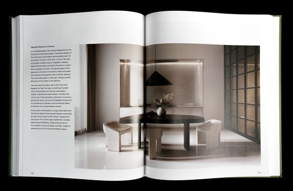 Book cover of 70 Ideas From Global Best Interior Design II, with a white interior living space with sofas, a table with vases and unit. Published by Artpower International.