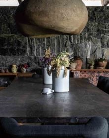 Interior living space in brown tones, with mosaic fronted cabinet on cover of 'Contemporary Wabi-Sabi Style', by Artpower International.