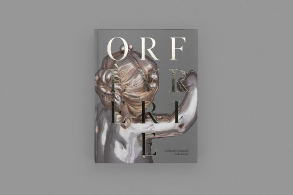 Book cover of The French Silverware in the Calouste Gulbenkian Collection; featuring a silver figure of a child. Published by Fundação Calouste Gulbenkian.