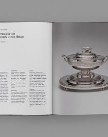 Book cover of The French Silverware in the Calouste Gulbenkian Collection; featuring a silver figure of a child. Published by Fundação Calouste Gulbenkian.