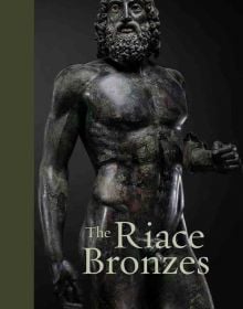 Book cover of The Riace Bronzes, featuring a Greek bronze sculpture of naked male warrior with beard. Published by 5 Continents Editions.