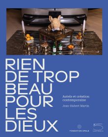 Book cover of Nothing Too Beautiful for the Gods: Altars and Contemporary Creation, featuring an altar with a fake head of a pig, alongside fruit and bottles. Published by 5 Continents Editions.