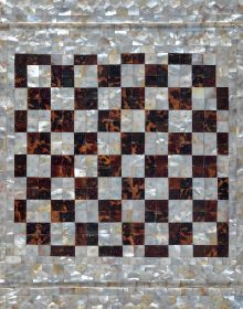 Book cover of Chess and Brain: Art & Science, with a decorative chess board. Published by Franco Maria Ricci editore.