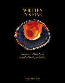Book cover of Written in Stone: Minerals collected and described by Roger Caillois, with an orange and blue semi-precious stone. Published by Franco Maria Ricci editore.