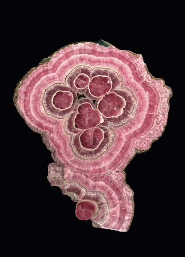 Book cover of Written in Stone: Minerals collected and described by Roger Caillois, with an orange and blue semi-precious stone. Published by Franco Maria Ricci editore.