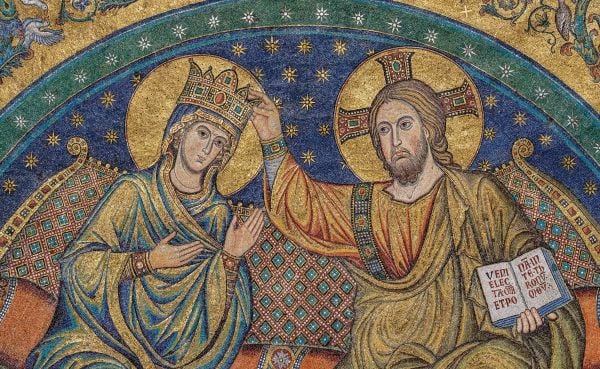 Book cover of The Basilica of Santa Maria Maggiore; featuring the Italian church lit up at night. Published by Scripta Maneant Editori.