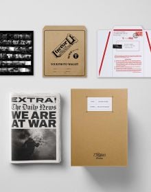 Book cover of We Are At War; with newspaper articles and brown document folders. Published by L'Artiere.