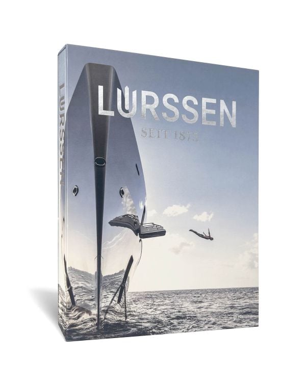 Book cover of Lürssen; featuring a superyacht floating on the ocean, with a swimmer jumping off the side. Published by PRINT The Book Agency.