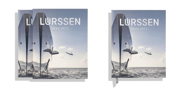 Book cover of Lürssen; featuring a superyacht floating on the ocean, with a swimmer jumping off the side. Published by PRINT The Book Agency.